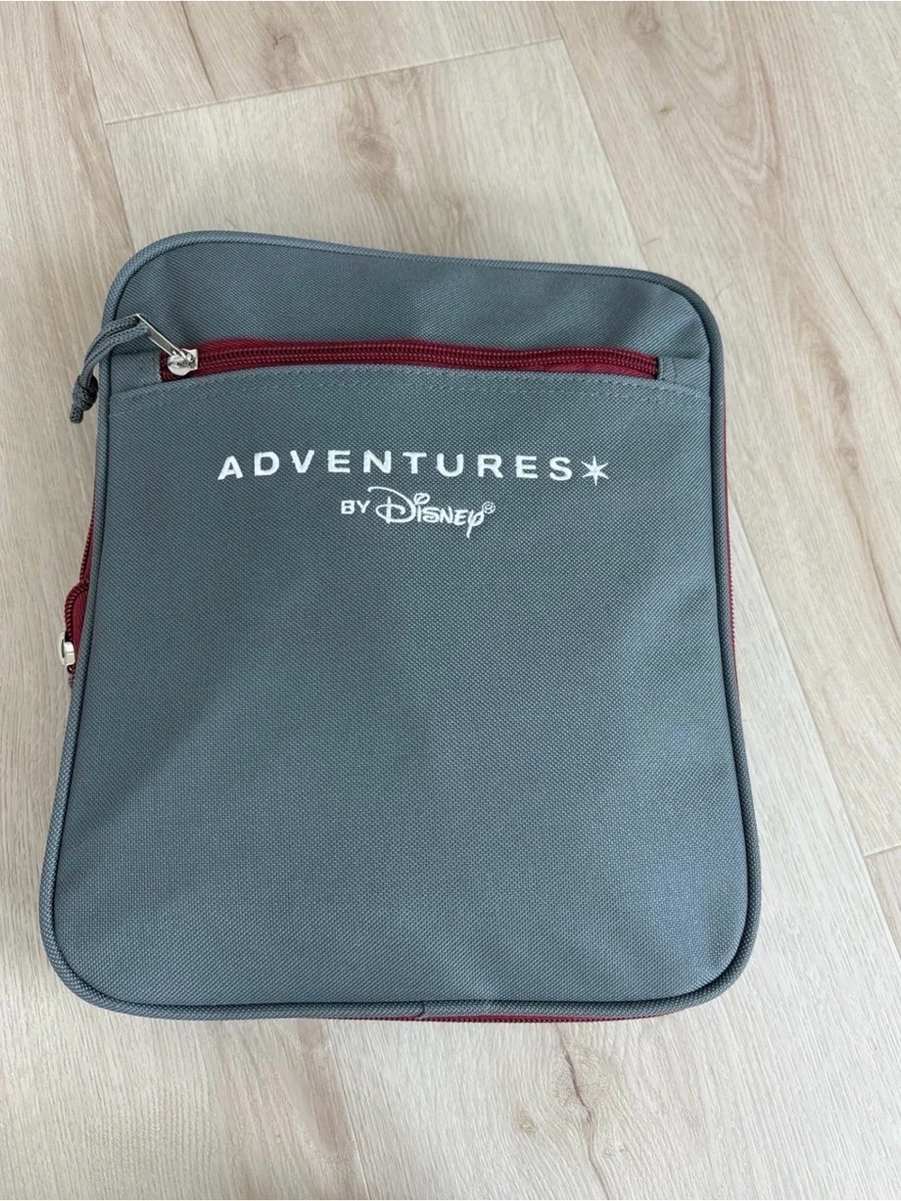 Disney Gray Duffel-Style Travel bag with Red Zipper Accents